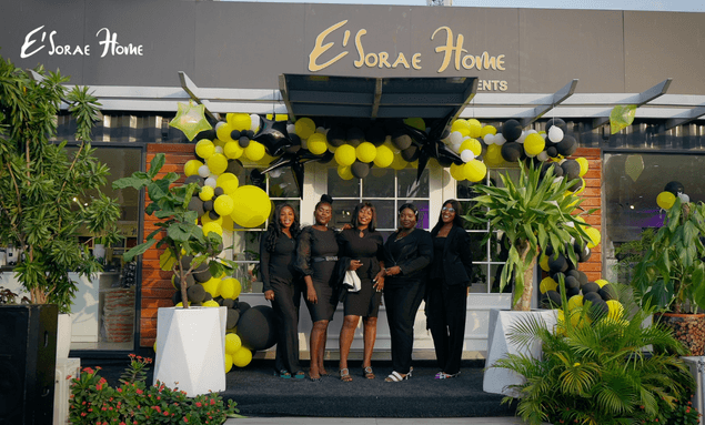 E'Sorae Home team celebrating 14 years outside the storefront