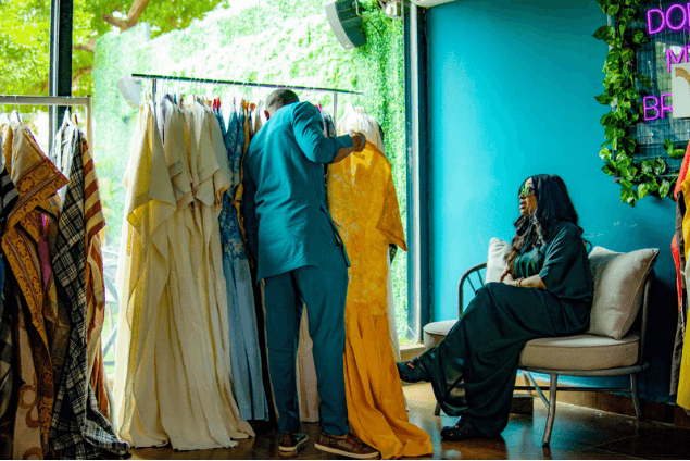 Guests browsing garments in the Republic of Ruru studio