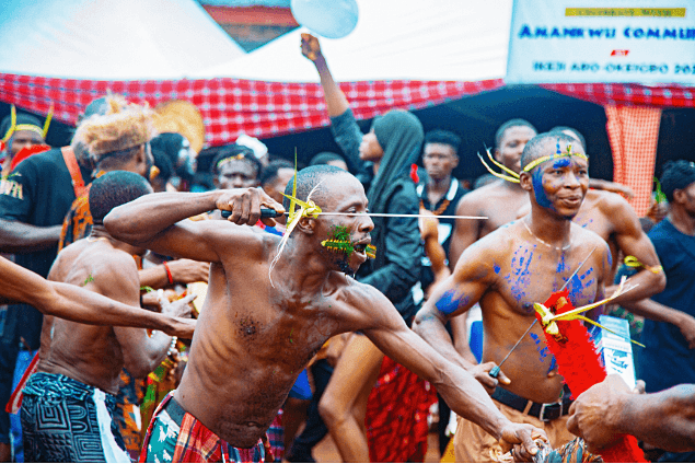 Intense ritual moment with body paint and ceremonial objects